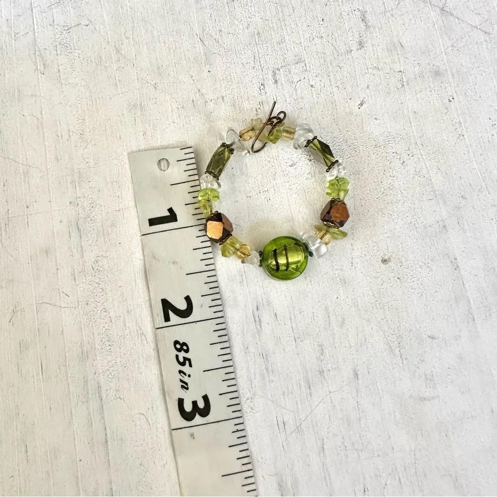 Green beaded circle earrings